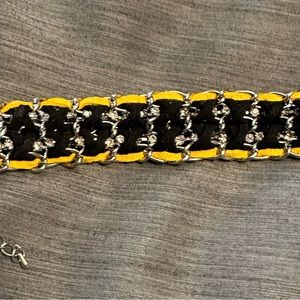 NWOT Black and yellow faux leather bracelet college colors